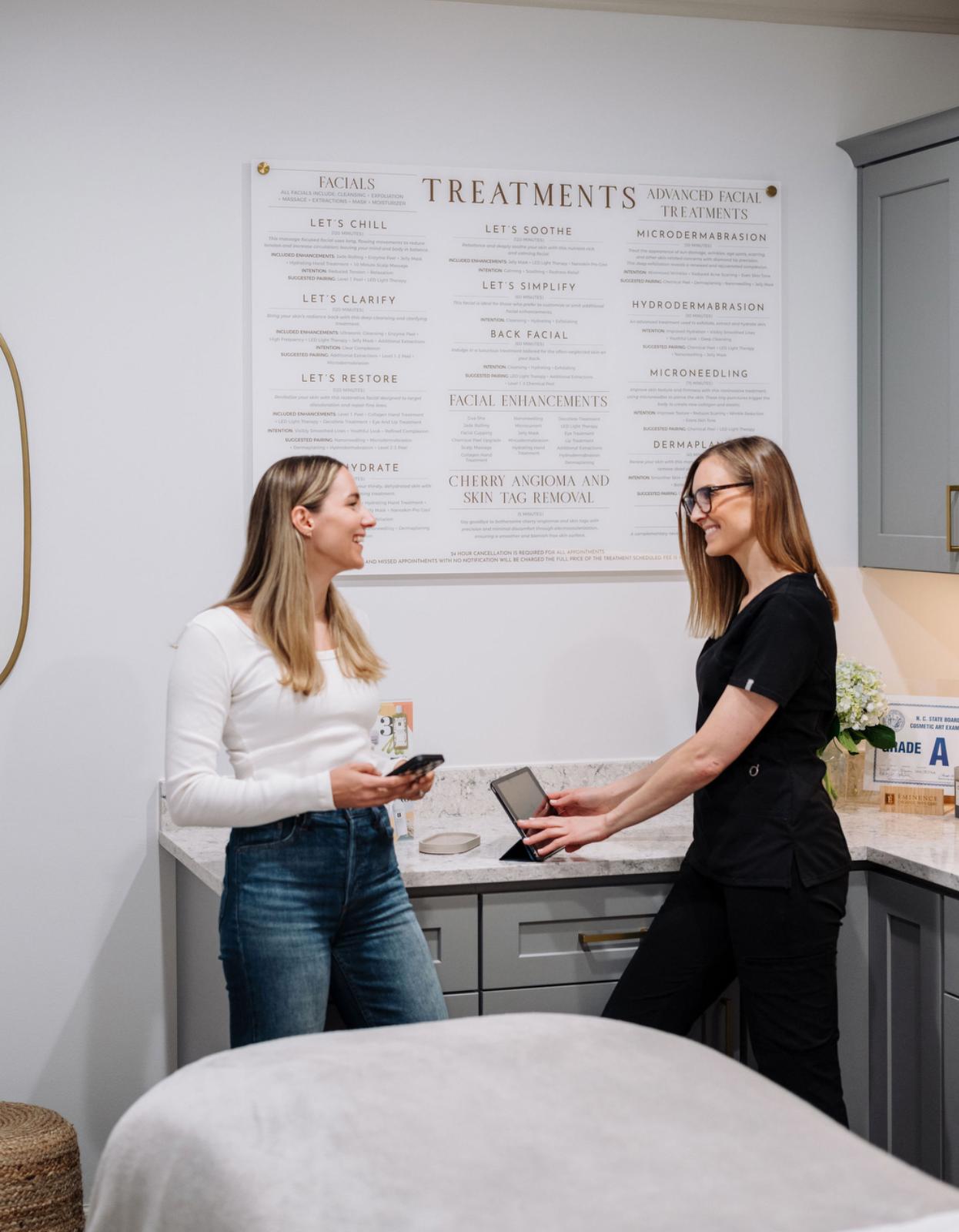 Rachel Ward, owner and Esthetician of Dapper Skin Studio scheduling an appointment with a client