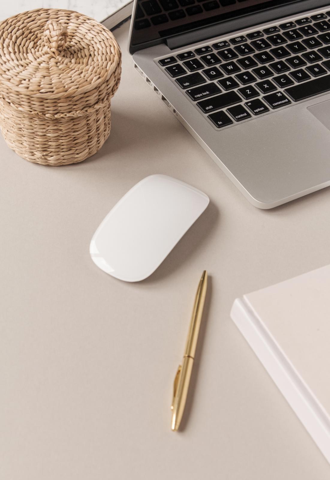 Laptop, mouse and pen for scheduling appointment