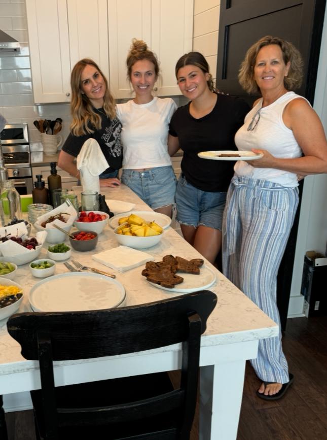 Rachel Ward, with family enjoying a home cooked meal